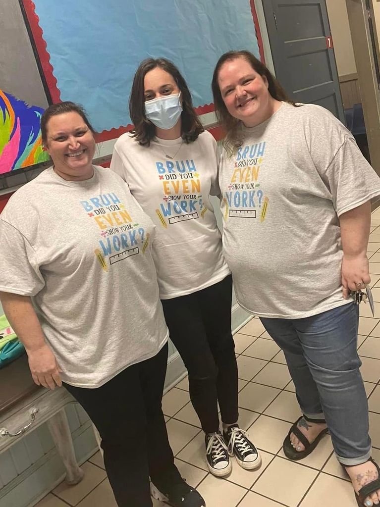 Three female teachers wearing shirts that say, "Bruh did you even show your work?"